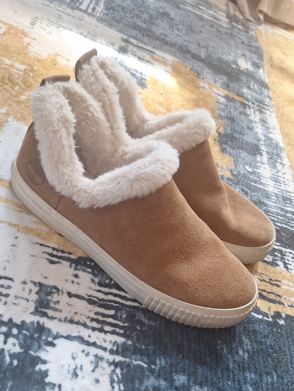 Timberland Women’s Faux-Shearling Slip-On Slippers in Tan and Cream